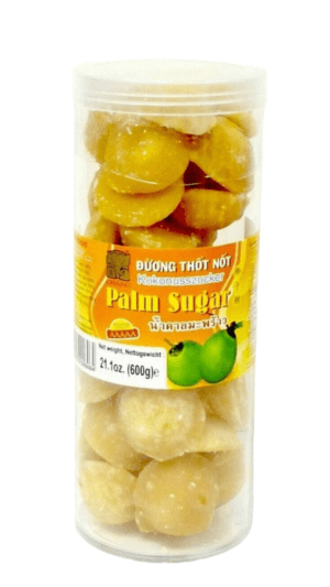 Palm sugar pieces in clear jar.