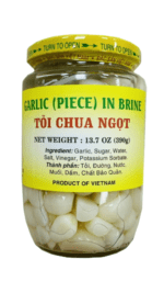 Jar of Vietnamese pickled garlic cloves.