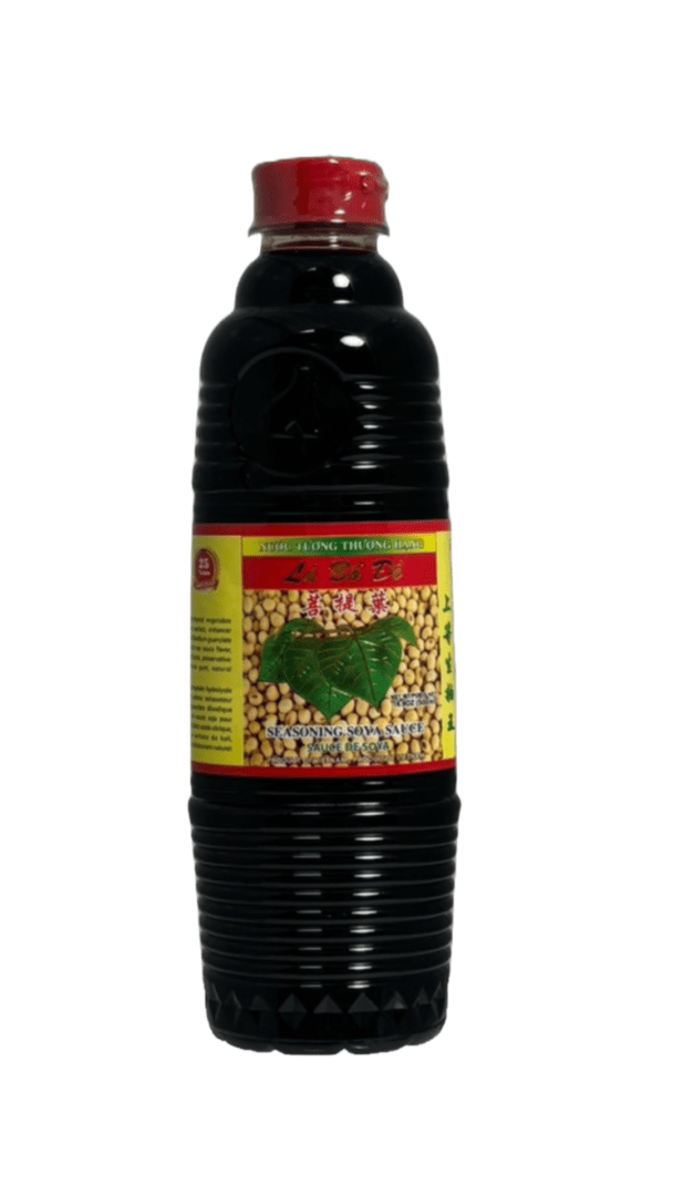 Soy sauce bottle with red cap.