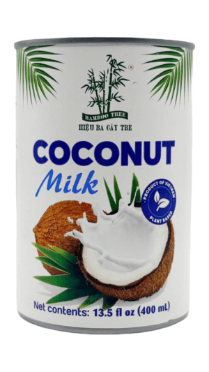 Can of coconut milk with coconut halves